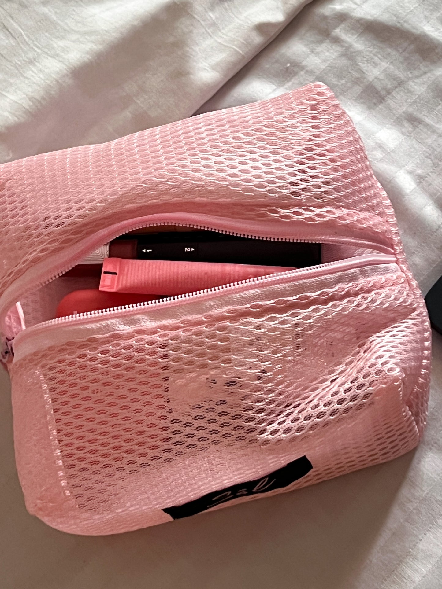 Pink mesh pouch