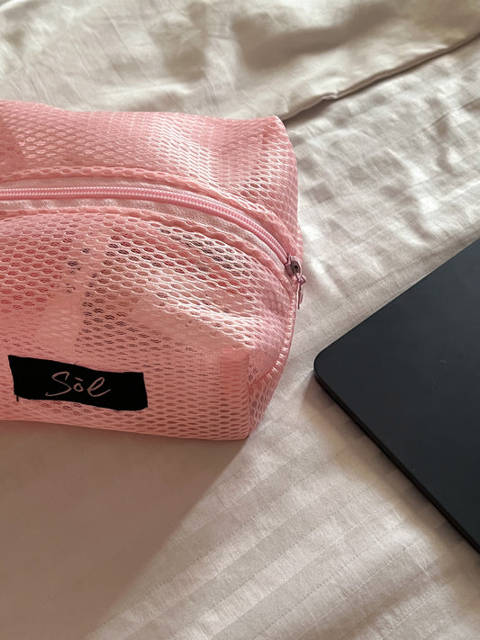 Pink mesh pouch